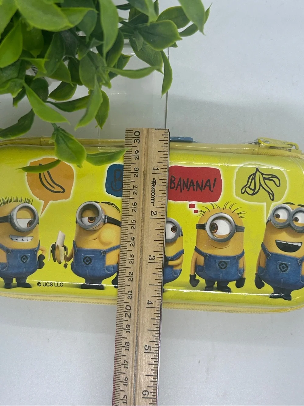 Yellow Minions character zippered pencil case graphics of various Minions.NWT